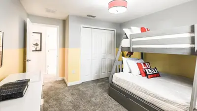 a bedroom with two bunk beds and a hallway at Last Minute Disney Getaway Private Pool Themed Bedrooms. Book Now 93749 in Kissimmee
