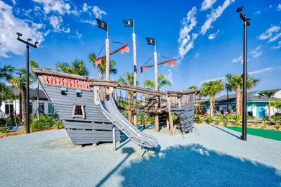 a playground at a resort with a slide at Storey Lake Resort 1092 - Hosted by Top Villas in Kissimmee