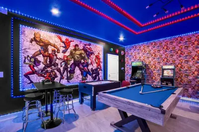 a room with two pool tables and a mural at Storey Lake Resort 1095 - Hosted by Top Villas in Kissimmee
