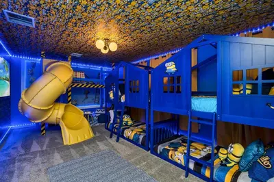 a blue room with a slide in it at Storey Lake Resort 1095 - Hosted by Top Villas in Kissimmee