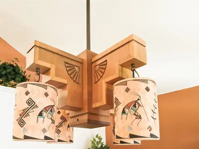 a wooden chandelier hanging from a ceiling at 5 Bed 8002 in Kissimmee