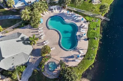 an aerial view of a swimming pool at a resort at Disney and Airport 15 minutes from Luxury Condo in Orlando