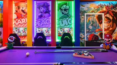 a purple pool table in a game room at Luxurious 10-Bed Lakefront Retreat Near Disney in Kissimmee