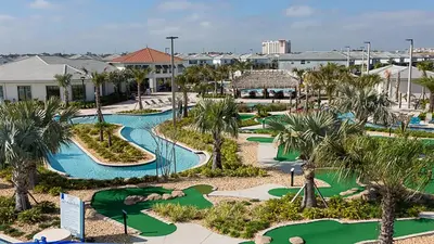 an aerial view of a golf course at a resort at Storey Lake Resort 6br Family Villa Pool by Disney in Kissimmee