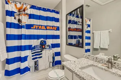 a star wars bathroom with a star wars shower curtain at T2501M Windsor Hills Resort 3Bedrm Private Pool in Orlando