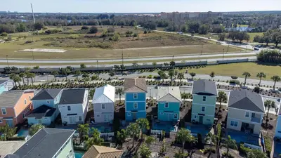 an aerial view of a row of houses in a subdivision at Private Pool! Big and Stylish House! in Orlando