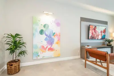 a room with a painting of a teddy bear on the wall at 8005 Stunning Villa Disney Park Proximity in Orlando