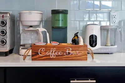 a coffee bar sign sitting on top of a kitchen counter at Storey Lake Escape w/ Pool, Games & Water Park in Kissimmee