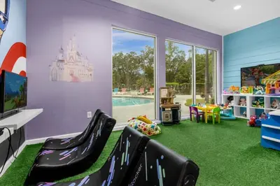 a childs play room with a castle on the wall at 3 Bedrooms 2 Bathrooms Lucaya Village 13-107 in Kissimmee