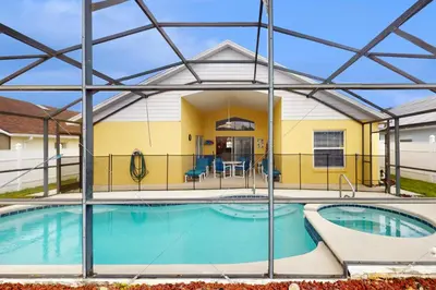 a view of a swimming pool with a metal structure at Disney 15 Min - Sleeps 8 - Private Pool in Kissimmee