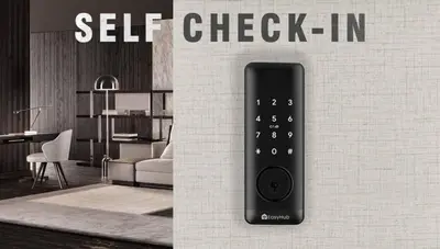 a remote control hanging on a wall in a living room at Modern 3BR3BA Home at The Hub Reserve in Kissimmee