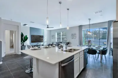 a kitchen with a sink and a counter top at BV310MB - Disney & Universal heroes - 16 guests in Kissimmee