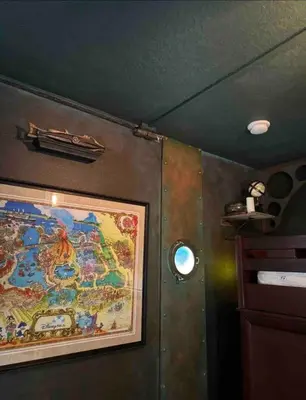 a room with a large map on the wall at Enchanted Jungle Themed Home Pool 3mi to Disney in Kissimmee