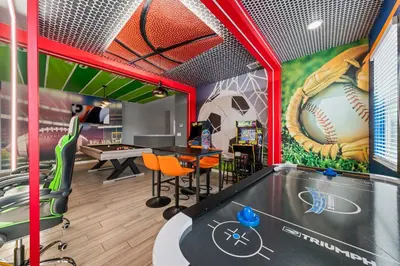 a room with a ping pong table and a baseball mural at Big Family Home with Game Room Sleeps 28 BLV104 in Kissimmee