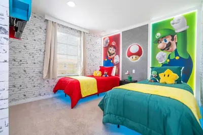 a childs bedroom with two beds and a toy story mural at Perfect Themed 3 BD Hot tub renovated - 3013 in Kissimmee