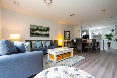 a living room with a couch and a table at 5* House 5* Resort Orlando. Location location location in Orlando