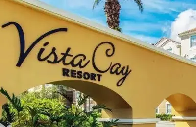 a sign for a hotel in a yellow building at 5* House 5* Resort Orlando. Location location location in Orlando