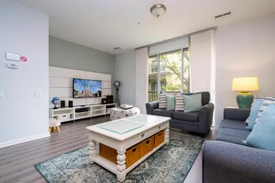 a living room with a couch and a table at 5* House 5* Resort Orlando. Location location location in Orlando