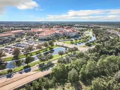 an aerial view of a resort with a river and trees at 1Bed/1Bath Pet Friendly Condo at the Melia in Orlando
