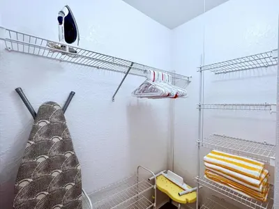 a bathroom with a shower and a towel rack at Lovely Family Town home in Great Location townhouse in Kissimmee
