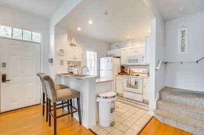 a kitchen with a sink and a counter top at 11 Mi to Disney Venetian Bay Villages Townhome! in Kissimmee