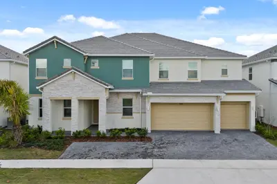 a house with a green and white house at Brand New Masterpiece 15 En-Suites SON105 in Kissimmee