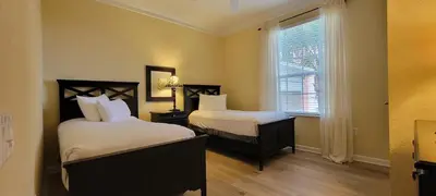 a bedroom with two beds and a window at Gorgeous 3 Bed Lakeview, Vista Cay - 1010 in Orlando