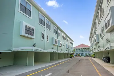 an empty street in front of a building at Ultimate Summer Retreat - TownHome by Disney! in Orlando