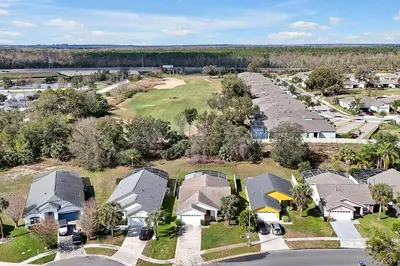 an aerial view of a residential neighborhood with houses at Minutes from Disney - Entertainment Haven with Pool in Orlando