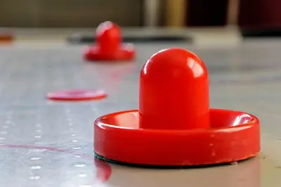 a red toy hat sitting on top of a table at Minutes from Disney - Entertainment Haven with Pool in Orlando