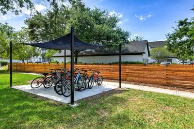 a group of bikes parked next to a fence at Cozy Escape - Disney Universal SeaWorld in Orlando