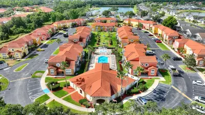 an overhead view of a residential neighborhood with orange roofs at Allure - Sleeps 8 - 3 BDM - Disney in Kissimmee