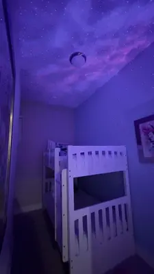 a purple room with a bed and a purple ceiling at 4br Disney Retreat Gated Resort with Pool & Hot Tub in Orlando