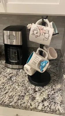 a coffee maker on a counter next to a coffeemaker at 4br Disney Retreat Gated Resort with Pool & Hot Tub in Orlando