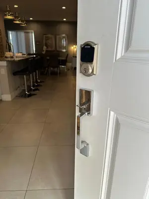 a door with a view of a dining room at 4br Disney Retreat Gated Resort with Pool & Hot Tub in Orlando