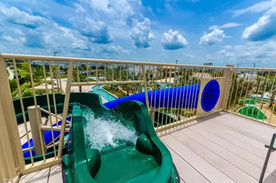 a water slide on a balcony at a resort at 3120 Paradox Circle 301 in Kissimmee