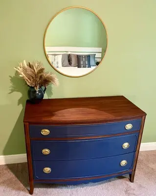 a mirror on top of a dresser in a room at Sweet Stay with fully fenced yard in Sanford