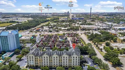 an aerial view of a building in a city at Pool view apartment near Epic Universe and Universal Studios in Orlando