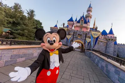 a mickey standing in front of a castle at NEW5 APT NrUCF PETSOK PRIVATE patioENTRY LAUNDRY in Orlando