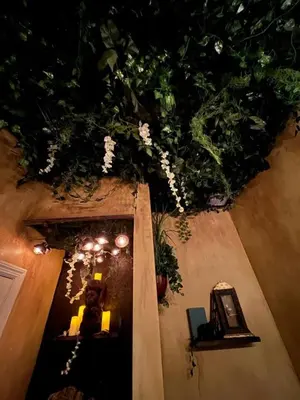 an overhead view of a room with a table and flowers at Magical Themed Home, Potter, Peter Pan 3mi Disney in Kissimmee