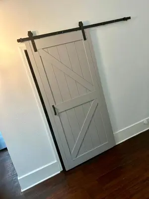 a sliding garage door with a rail on it at Renovated Peaceful Luxury Walk to Mall Park Publix in Orlando