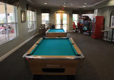 a billiard room with two pool tables in it at Wonderful Life at Windsor Hills in Orlando