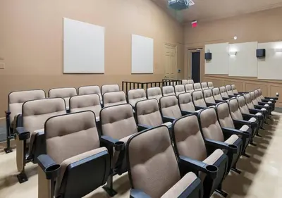 an empty lecture room with rows of chairs at Wonderful Life at Windsor Hills in Orlando