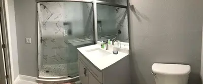 a bathroom with a sink and a shower and a toilet at Cozy apartment near Disney with 3 bedrooms 58 in Kissimmee