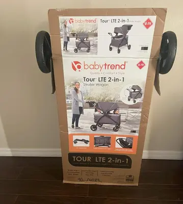 a box of baby trend four life in baby carriage at 5Bd 2 Bath with Gameroom & Pool 1 story House in Orlando
