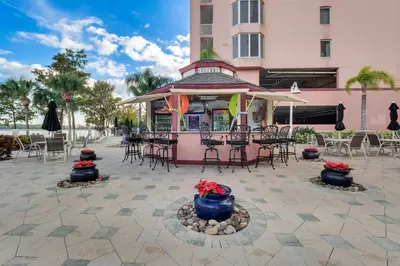 a gazebo with chairs and tables in a patio at K and J Orlando in Orlando