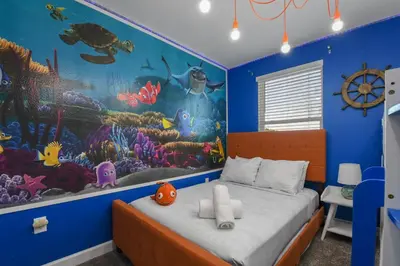a bedroom with an under the ocean mural at Lake View Cozy Home w/ Pool & Games Near Disney in Kissimmee
