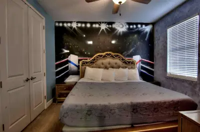 a bedroom with a bed with a star wars wall at All Vacation Mansion w Spa-Pool-Cinema Sleep 40 in Kissimmee