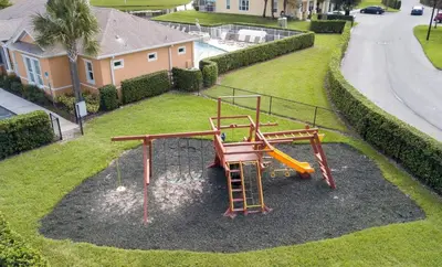 an aerial view of a playground with a slide at Comfortable home Near Disney & Private Pool 17414 in Orlando
