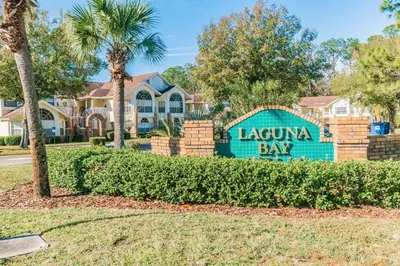 a sign for laquula bay in front of a house at HARRY POTTER LIVES HERE! Unforgettable Home, Pool, Sleeps 8, Near Dis, LOW Rates! in Kissimmee